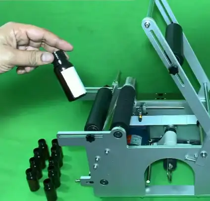 Bottle labeling machine in use at Pakistan manufacturing facility